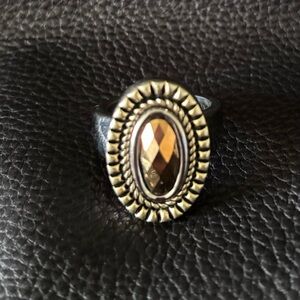 Lia Sophia ring with copper center stone and rope detail